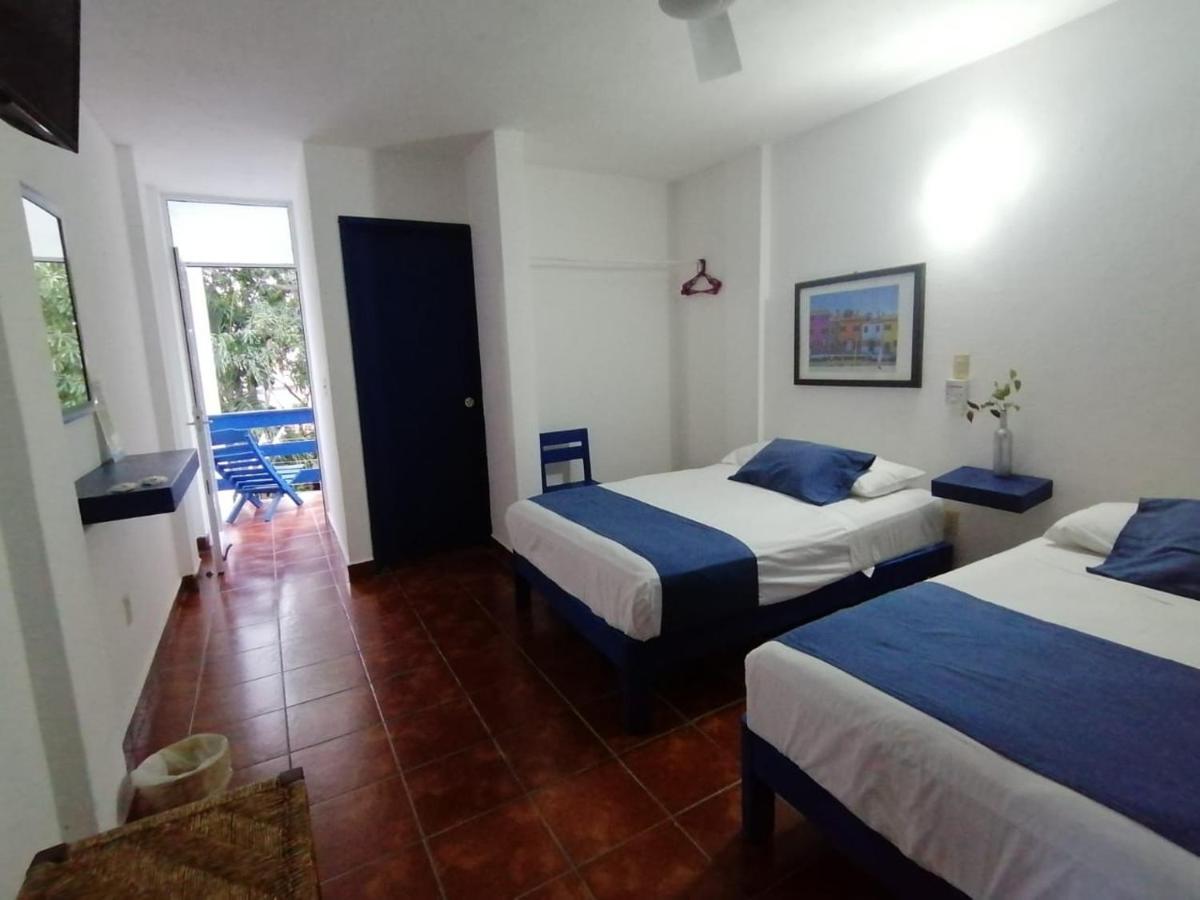 Hotel & Hostal Mayflower بويرتو إسكونديدو المظهر الخارجي الصورة